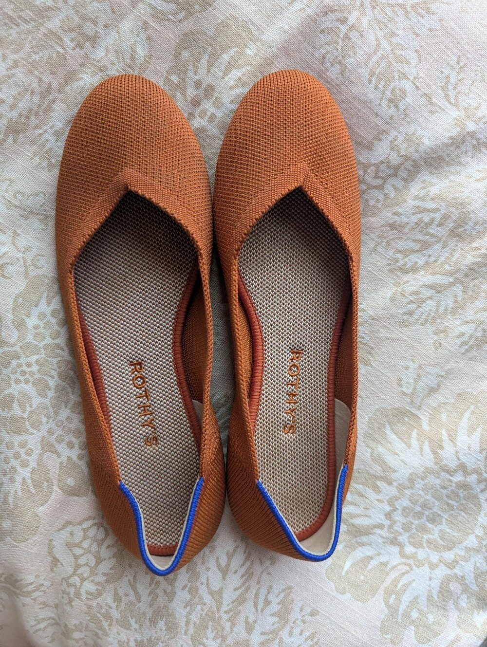 Rothy's Persimmon Round Toe Flats with Blue Accent